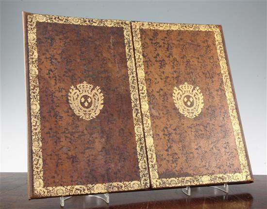 A French gilt tooled and brown leather double folding desk blotter, W.1ft 8in.